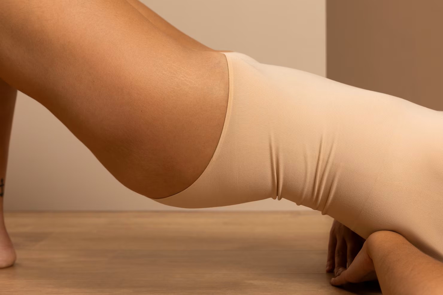 Woman posing in a white crop top